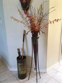 Tall, whimsical metal floral vase with silk decor, also umbrella stand and canes