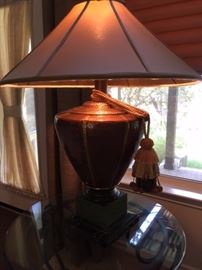 Large, hammered copper table lamp with shade and tassel decor; refer to detail photo.