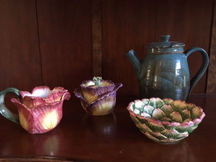 Various whimsical glazed pottery servers by Fitz & Floyd; also glazed pottery tea pots 
