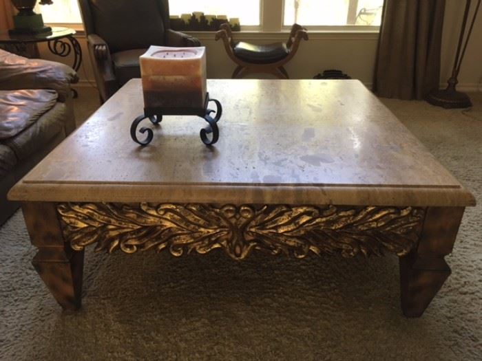 Large, weighty square coffee table with stone top and carved wood with gilt base; accommodates 6!