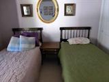 Vintage twin bedroom set includes twin beds, nightstand, desk and chair.