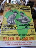 Original and stamped George Foreman and Mohammad Ali poster