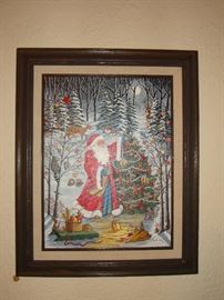 Framed painted scene of Father Christmas decorating a tree