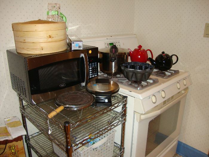 Bamboo stacking steamer, Cuisinart waffle maker, Nordicware bundt pan, Fagor 6 qt pressure cooker, Chantal ceramic teapot