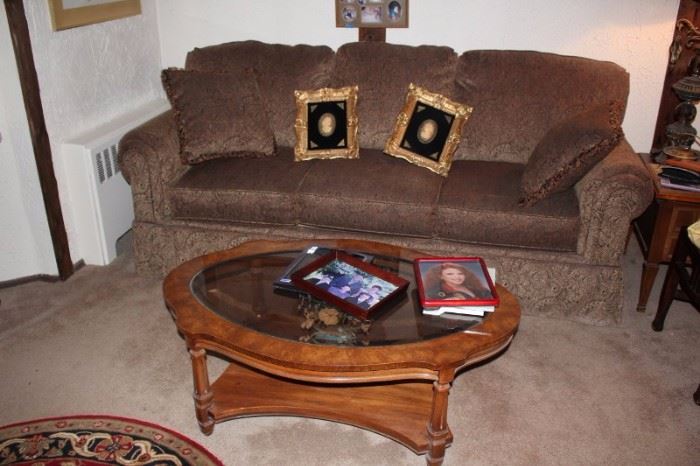 Sofa and Coffee Table with Pair of Photo Frames