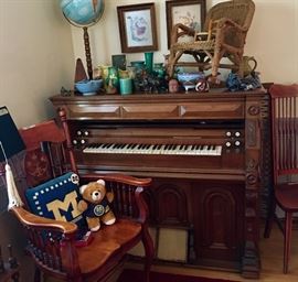 University of Michigan gear throughout! Go Blue! Vintage ceramic ware, wicker child's rocker, needlepoint framed art, solid wood 3 piece grouping with armed chair, chair, loveseat.