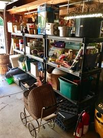 Antique reed baby carriage, mini fridge, canning supplies, fire extinguisher, bushel baskets, roaster, cookie jars, casseroles, camping equipment including marshmallow forks