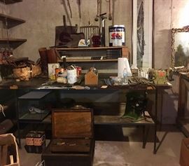 Leather English riding boots, metal tools, implements, motor tools.