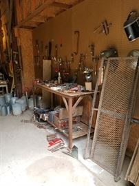 Hand tools including primitives, hitch hauler, welding face guards, poultry feeders, watering jars, tool boxes, vintage wooden with metal sleds