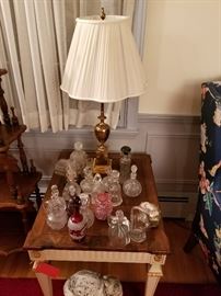 Glass cruets, table lamp, lifesize ceramic cat