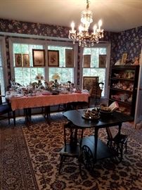 Child size chairs, tea server buffet table, electrified oil lamps with glass shades and globes, barrister bookcase, antique dolls, framed needlepoint art, framed art works, milk glass, glass bottles and serving pieces