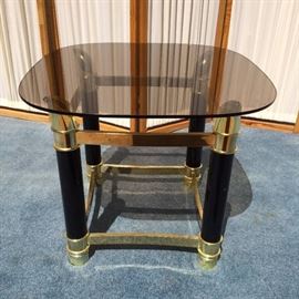Mid Century Modern Faux Tusk Horn Gold Brassy & Black Metal & Smoke Glass End Table In The Style Of Famed Designer Tommaso Barbi
