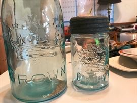 Vintage canning jars made by Crown. Aqua color.