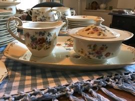 Creamer and sugar bowl with lid. Also, the serving platters are very unique!