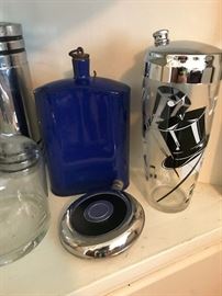 The blue metal/enamel flask was found way in the back corner of a cabinet!