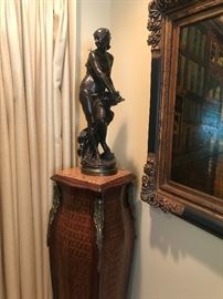 Signed bronze atop inlaid marbletop pedestal