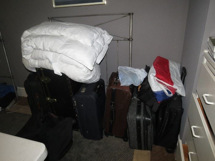 luggage and down comforter