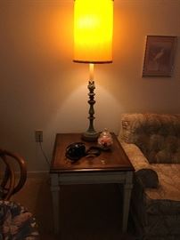 This is a Lane side table, made either in 1967 or 76, depending who you believe on how to read the dates. Beautiful condition, walnut bookmatches top. There are two of these tables and two of these lamps. 