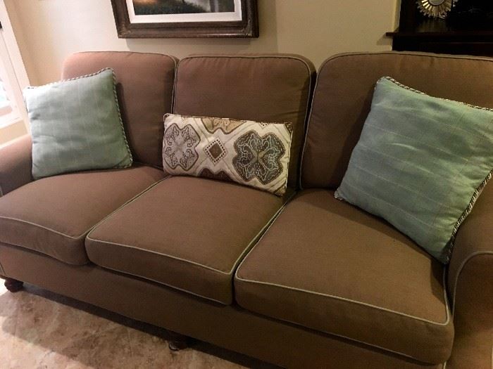 A pair of Highland House matching designer sofas
