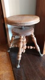 Piano stool with claw feet