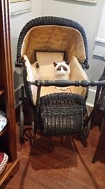 Large antique wicker baby stroller
