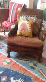 COWHIDE COVERED VINTAGE ARM CHAIR