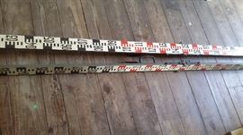TWO VINTAGE FOLDING SURVEY GAUGE MARKERS
