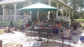 CHAIR KING PATIO SET...LARGE OVAL TABLE, 6 ROCKER CHAIRS,  NEW NEVER USED UMBRELLA...ALL IRON & NOT PLASTIC.