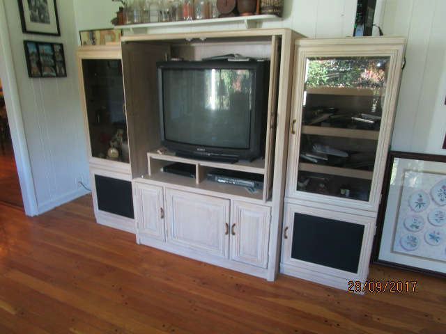 Entertainment armoire with matching side cabinets
