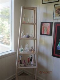 perfume bottles on ladder shelf (matches armoire)
