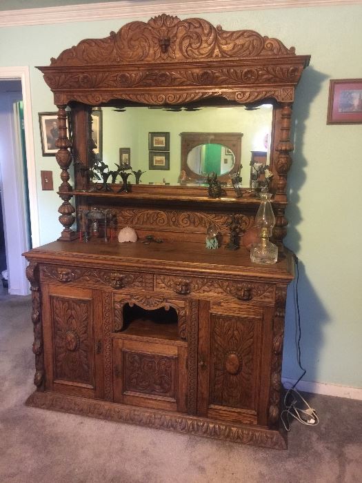 Heavily carved antique oak buffet with mirror, very nice!
