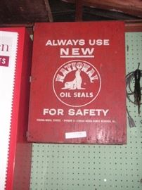 National oil seals red tin vintage cabinet