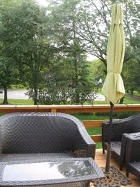 Wicker settee/umbrella/table