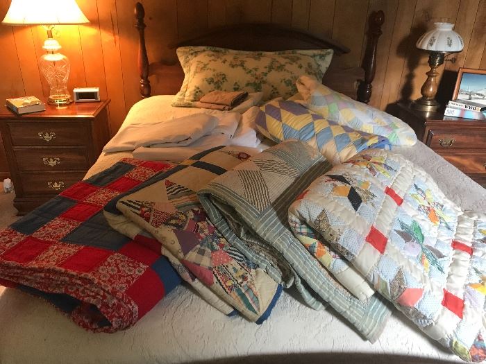 Hand stitched vintage quilts