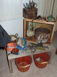 Miscellaneous primitive garden tools and hand tools.