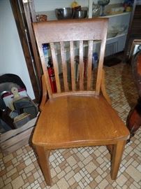  One of two matching vintage  wood chairs 