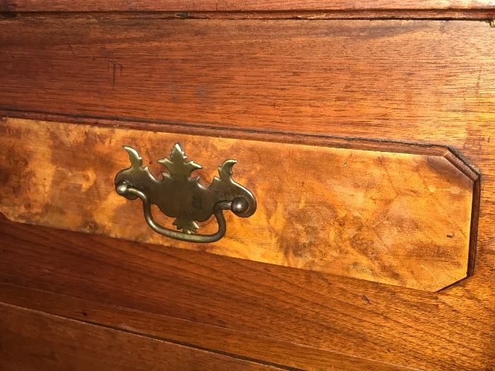 Close up of antique black walnut dresser