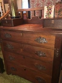 Antique black walnut dresser with hanky drawers and carved grape motive handle pulls 