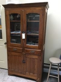 Antique cabinet with glass doors