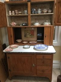 Antique Hoosier cabinet with porcelain top. Enoch Woods china. 