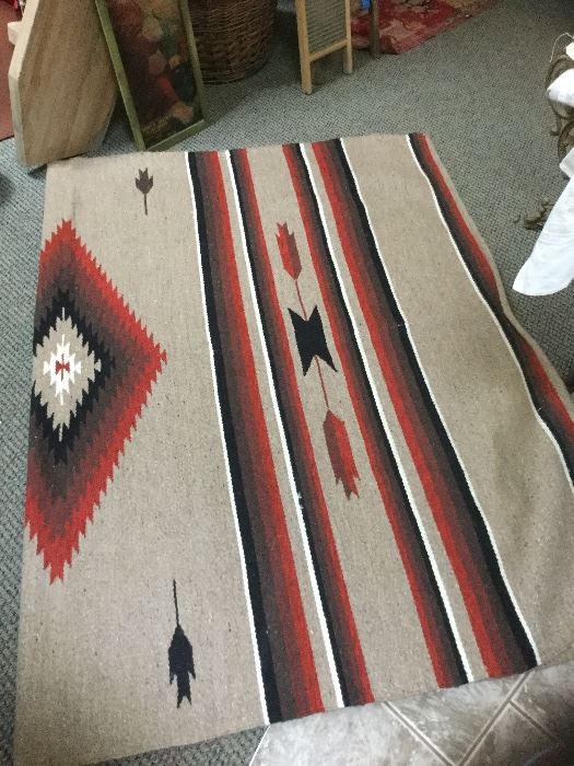 Navajo rug ( shown partially) 87" x 62"