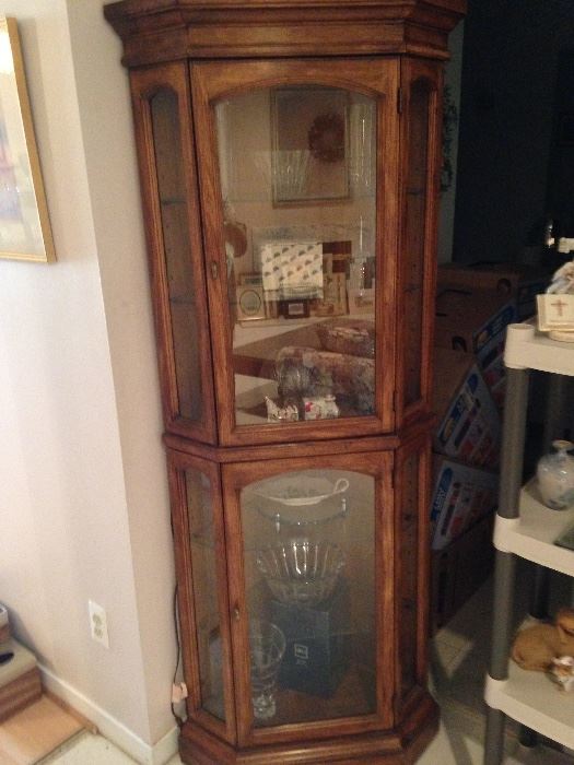 Solid wood lighted corner curio cabinet! By American of Martinsville