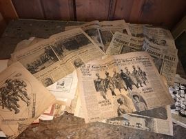 Old scrapbook of antique newspaper clippings and pages.  Sold as lot