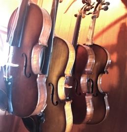 Antique and vintage violins.  no bows