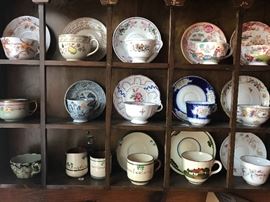 Many antique cups and saucers  Many 200 years old.