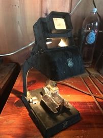 Bell and Howell with original oil