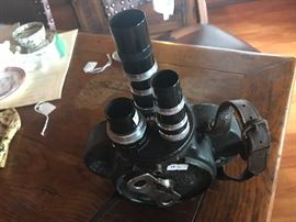  A rare Bell and Howell movie camera from the 1930's with additional collectible lenses.  Lenses priced separately