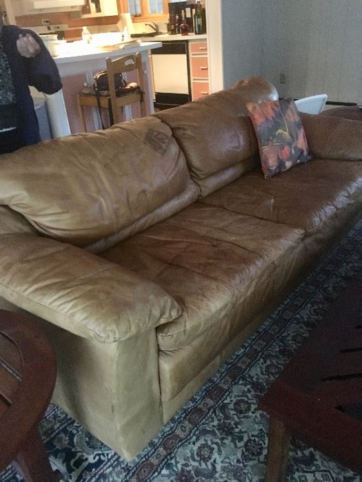 "Worked in" leather sofa