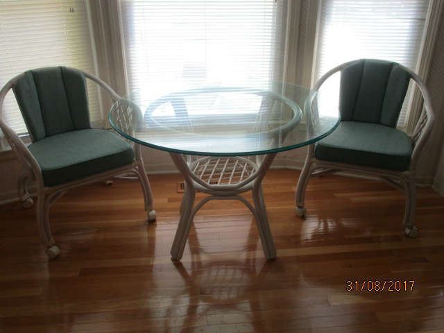Wicker and glass dinette set