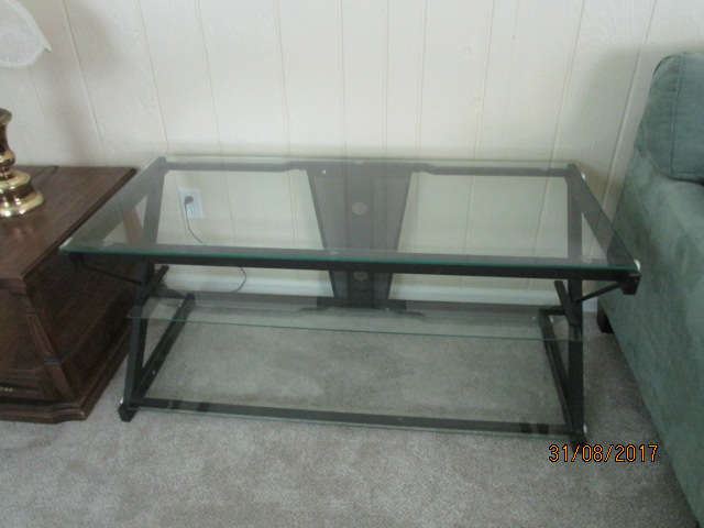 glass and metal coffee table/entertainment table